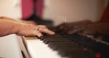 Elizabeth Koch playing piano